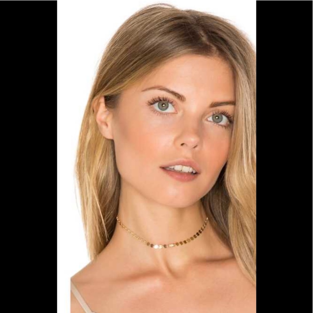 Gold disc choker.